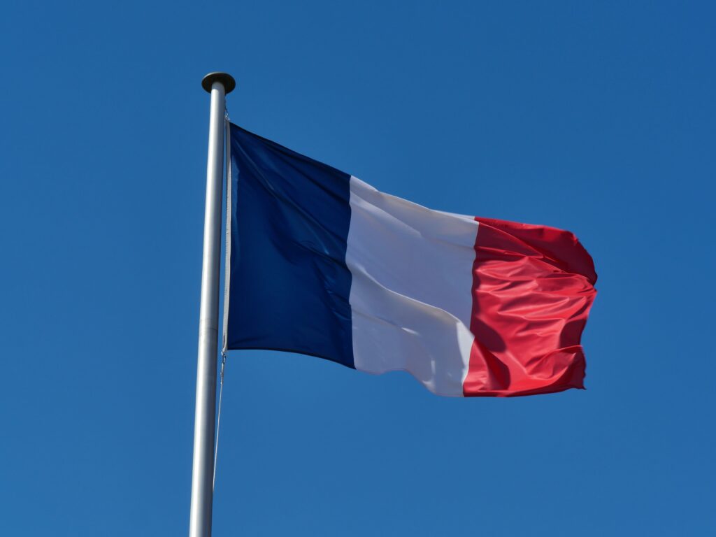French flag. Photo by Rafael Garcin on Unsplash.